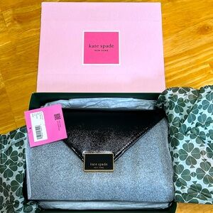 New in the box Kate Spade convertible clutch.